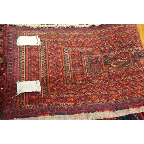 548 - Turkestan tekke torba or Kapanuk wall hanging with fringed decoration, 133cm x 80cm.