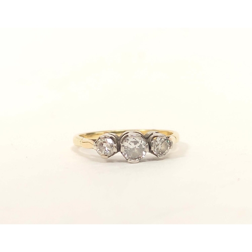 26 - 18ct gold three stone diamond ring. Size Q