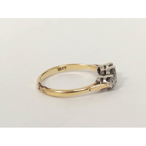 26 - 18ct gold three stone diamond ring. Size Q