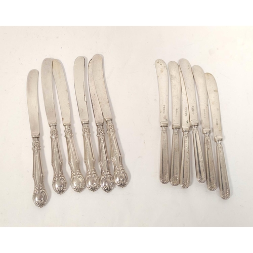 127 - Two sets of six silver handled butter knives, a Victorian engraved e.p. three piece tea set, a kettl... 