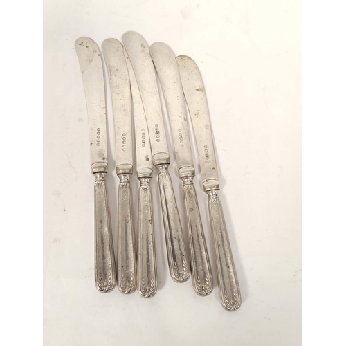 127 - Two sets of six silver handled butter knives, a Victorian engraved e.p. three piece tea set, a kettl... 