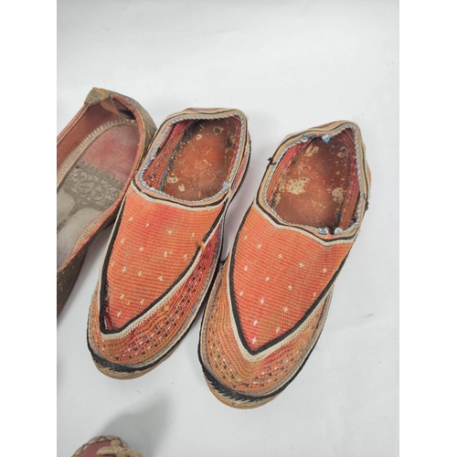 199 - Three pairs of Eastern Turkish and Mughal slippers. (3)