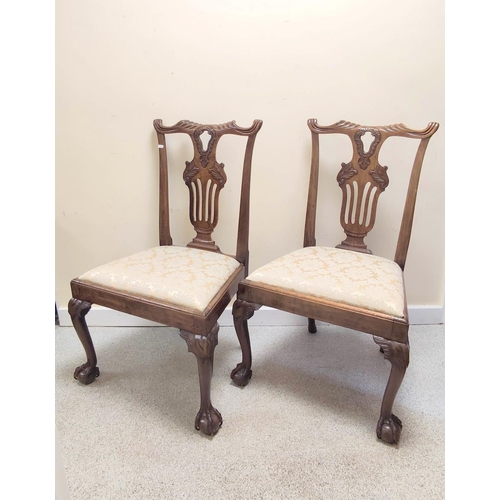 432 - Set of four Chippendale style mahogany dining chairs, yoke toprails & pierced backsplats above s... 