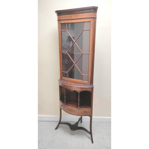 433 - Edwardian astragal glazed standing corner cabinet, the shelved top above galleried bow front underti... 