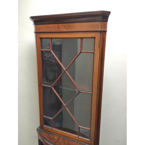 433 - Edwardian astragal glazed standing corner cabinet, the shelved top above galleried bow front underti... 