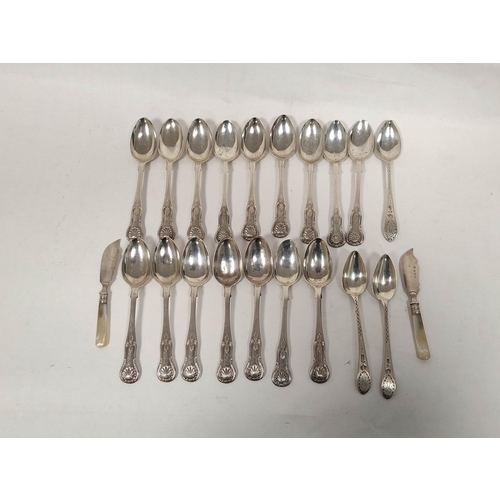 125 - Nineteen Scottish silver tea spoons and two butter knives.