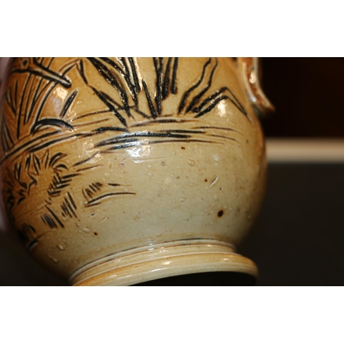 439 - Doulton Lambeth stoneware baluster jug with incised egret and cattail design by Hannah Barlow, impre... 