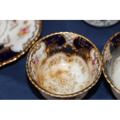 448 - Harlequin set of Coalport English porcelain cobalt blue gilt and hand-painted floral batwing pattern... 