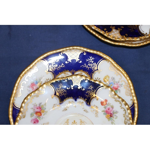 448 - Harlequin set of Coalport English porcelain cobalt blue gilt and hand-painted floral batwing pattern... 