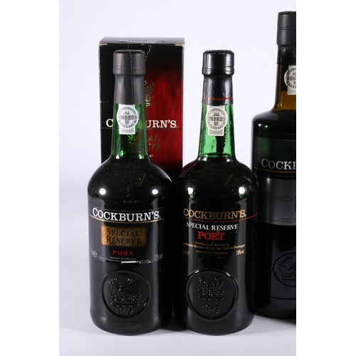 309 - Four bottles of COCKBURN's port including three Special Reserve 20% abv. 2x 75cl 1x 1litre, one boxe... 