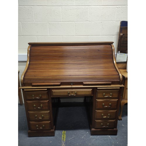 394 - Mid century teak roll top desk.