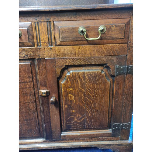 434 - Georgian style oak country dresser with plate rack, above three short drawers and two panel doors. R... 