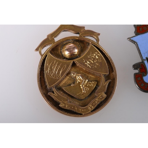 692 - 9ct gold medal fob, the obverse with lawn bowler, two shields, one dated 1928, a lawn bowl or jack a... 