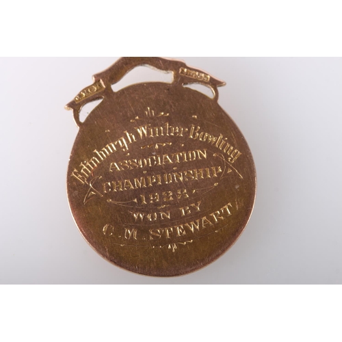 692 - 9ct gold medal fob, the obverse with lawn bowler, two shields, one dated 1928, a lawn bowl or jack a... 