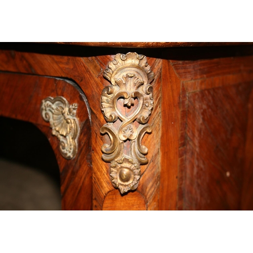 508 - French walnut two door cabinet, the serpentine edged marble top above two glazed panel doors, ormolu... 