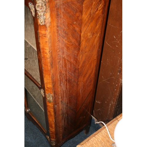 508 - French walnut two door cabinet, the serpentine edged marble top above two glazed panel doors, ormolu... 