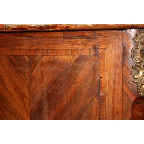 508 - French walnut two door cabinet, the serpentine edged marble top above two glazed panel doors, ormolu... 