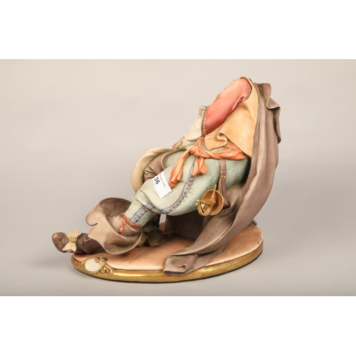 36 - Capodimonte figure of a sleeping cavalier