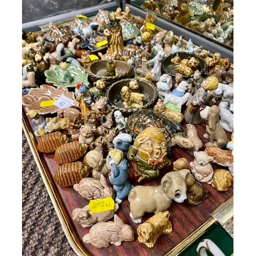 42 - Large quantity stoneware figures including Wade