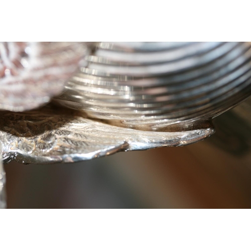 13 - Antique silver dish of shell form, hallmarked London 1837, makers mark rubbed, supported by white me... 