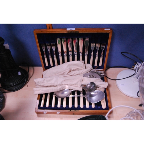 36 - Set of twelve EP fish knives and forks, cased, and assorted loose flatware, fish dividers, sauce lad... 