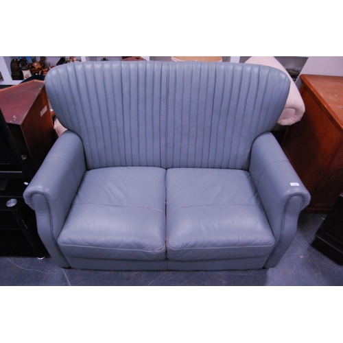 373 - Leather two-seater sofa.