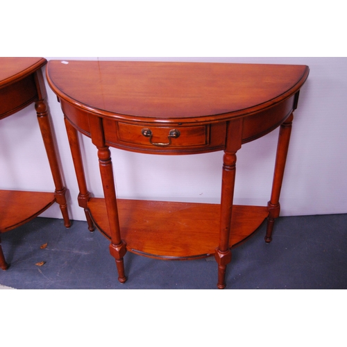 394 - Pair of modern demi-lune two-tier hall tables.