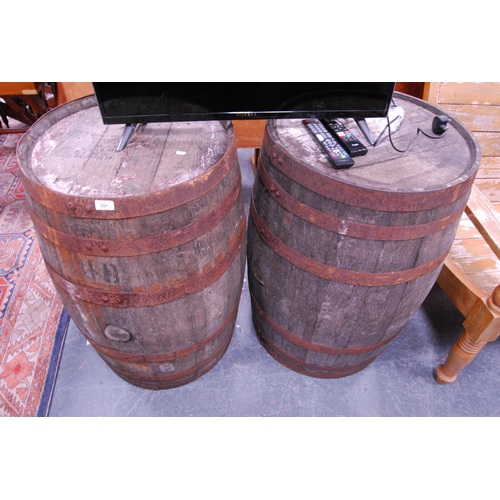 397 - Two metal-bound large coopered whisky barrels, stamped to the top of one 'Old Lewis Distillery'.  (2... 