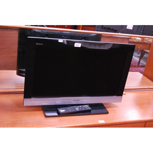 405 - Sony Bravia television with remote control.