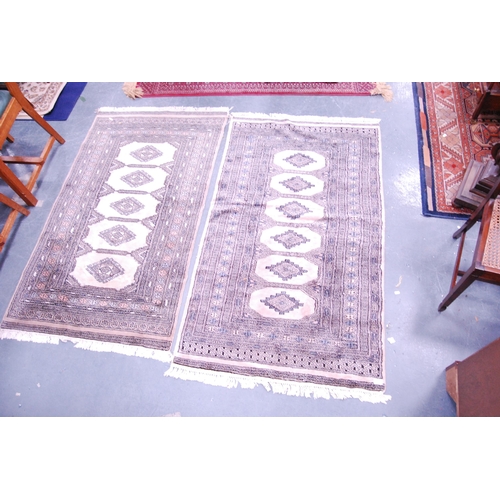411 - Pair of Turkish-style machine-made rugs.