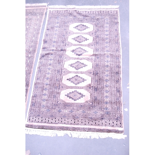 411 - Pair of Turkish-style machine-made rugs.