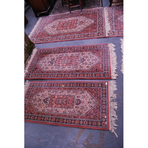 428 - Three small Turkish design machine-made rugs.