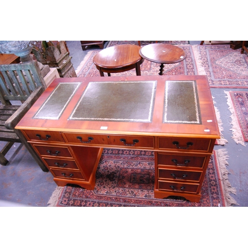 430 - Modern yew wood kneehole desk.