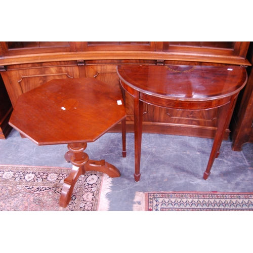 432 - Victorian-style mahogany octagonal table and an inlaid mahogany demi-lune table.  (2)