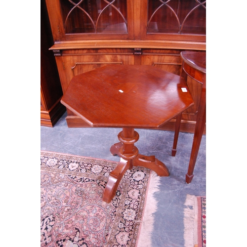 432 - Victorian-style mahogany octagonal table and an inlaid mahogany demi-lune table.  (2)