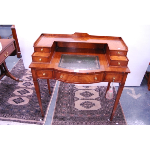 436 - Reproduction mahogany lady's escritoire with tooled inset and a similar chair.  (2)