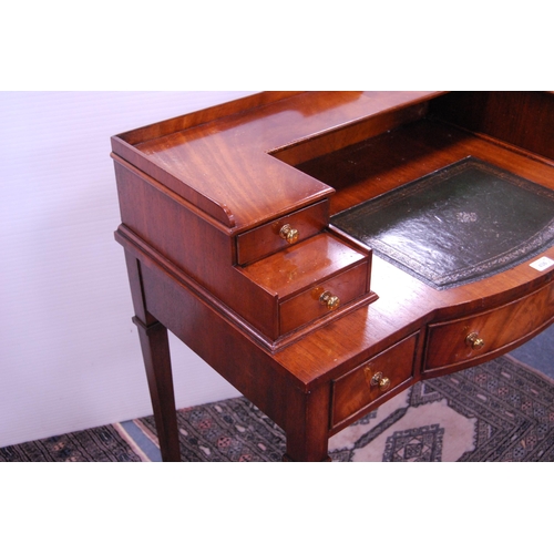 436 - Reproduction mahogany lady's escritoire with tooled inset and a similar chair.  (2)