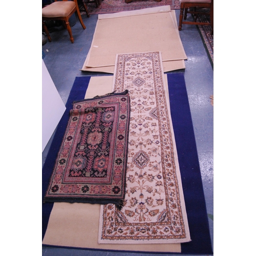 439 - Group of assorted machine-made rugs.  (4)