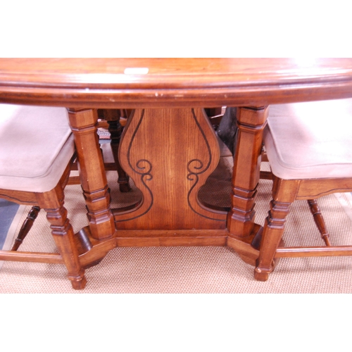 442 - Continental-style oak-effect dining table with two additional leaves, and a set of six Continental-s... 