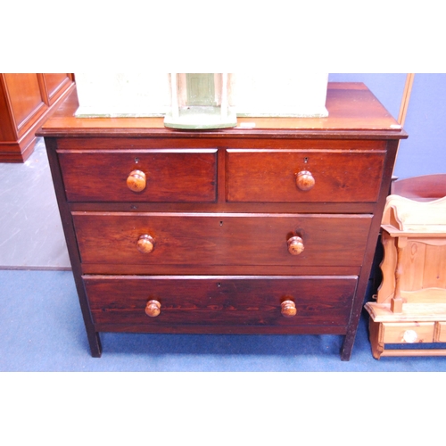 464 - Vintage stained wood chest of two short and two long drawers with turned handles.