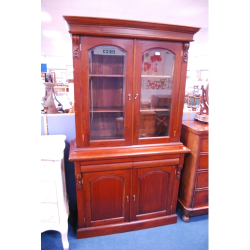 470 - Victorian-style mahogany two-door bookcase top on chiffonier base.