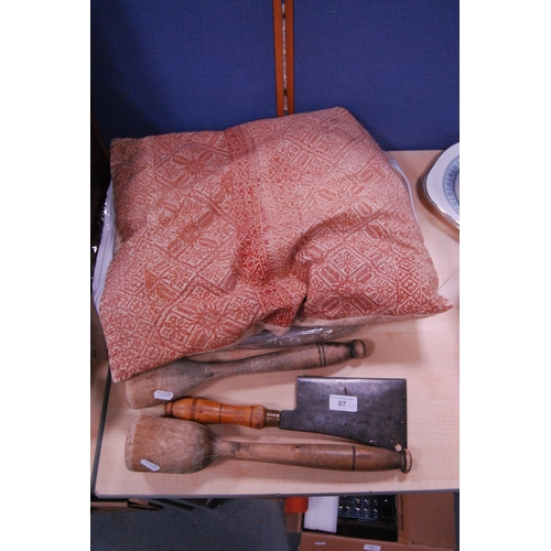 67 - Early 20th butcher's cleaver, wooden mashers and a cushion.