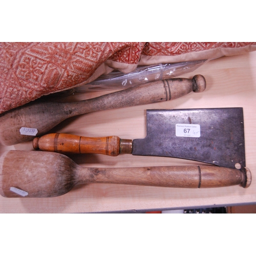 67 - Early 20th butcher's cleaver, wooden mashers and a cushion.