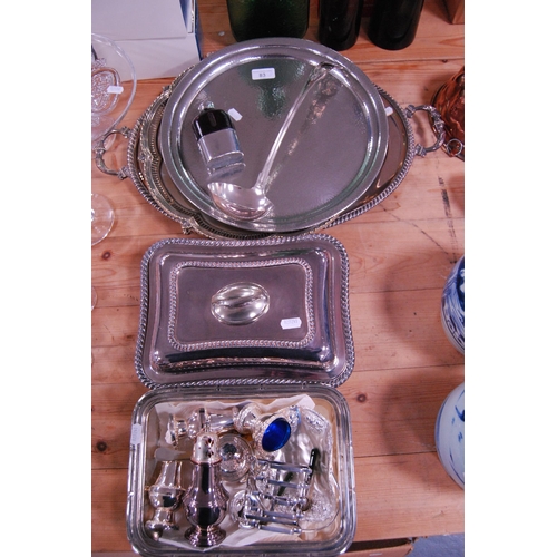 83 - EP and plated ware to include a twin-handled tray, pewter tray, hip flask, ladle, entrée dish... 