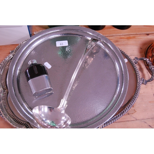 83 - EP and plated ware to include a twin-handled tray, pewter tray, hip flask, ladle, entrée dish... 