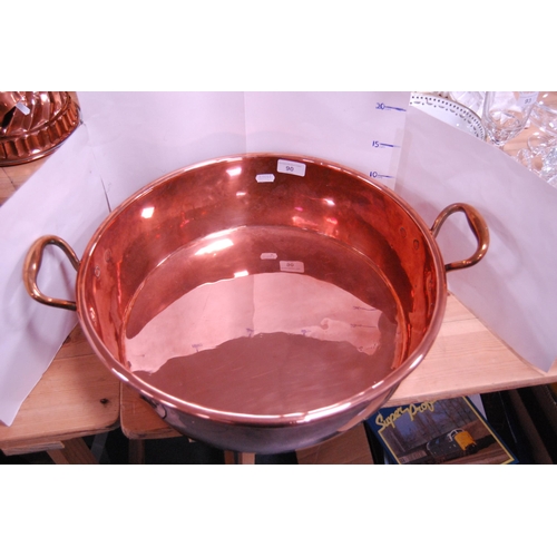 90 - Antique copper twin-handled skillet.