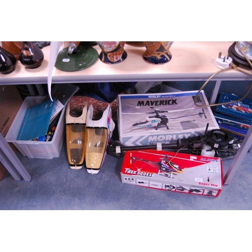 129 - Morley Helicopters model of a Maverick helicopter, Align T-Rex 500 ESP model helicopter, and various... 