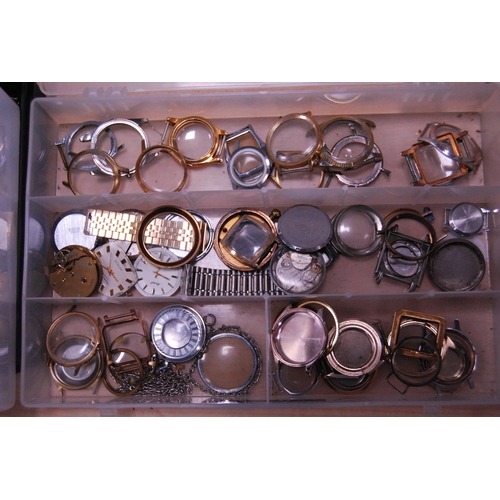 130 - Trays containing automatic and manual wind watch accessories to include dials, cases, and movements ... 