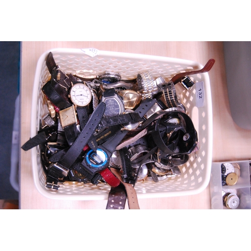 132 - Tub containing assorted quartz watches to include digital examples.