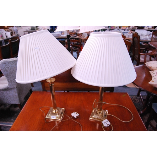 146 - Pair of modern Corinthian-style brass table lamps and shades.  (2)